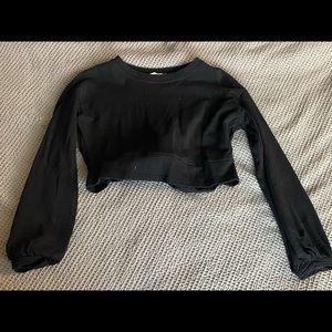 Light weight black sweater with open back